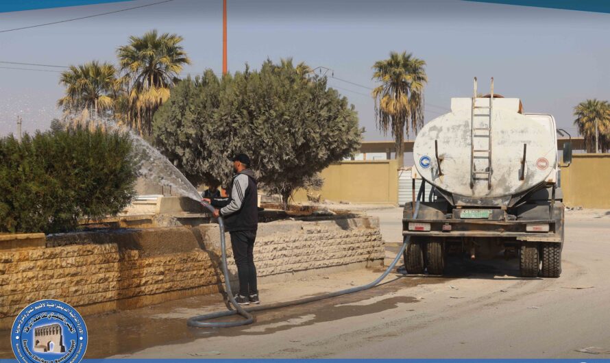 دائرة الحدائق والتشجير تجري أعمال تنظيف لدوار التموين