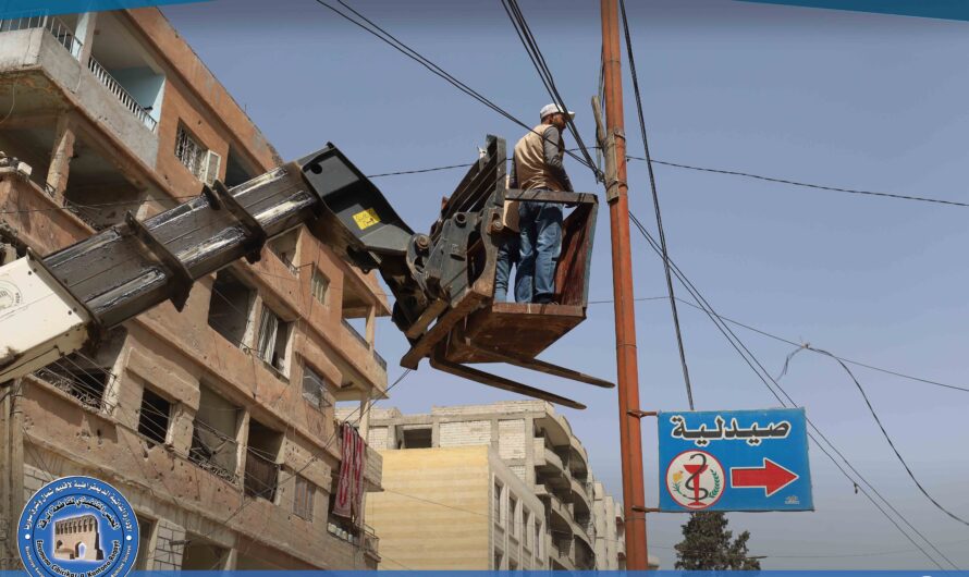 إزالة تجاوزات على شبكة الإنارة في شارع الملعب البلدي